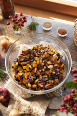 Fresh chopped plums, apples, onion and spices - preparation of chutney - homemade relish