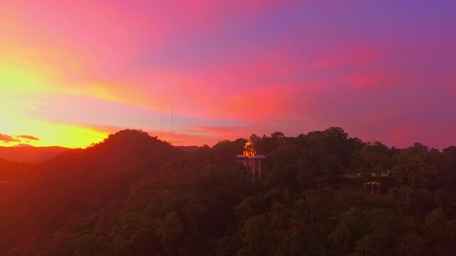 aerial view at Khao Rang viewpoint in twilight.
Khao Rang viewpoint tower is a popular landmark in Phuket town it is on 
Tung Ka hill in central of Phuket town. cityscape background.