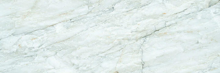White marble texture with subtle veining and natural patterns for elegant interior design.