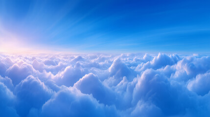 Naklejka premium Beautiful sunlight breaks over fluffy white clouds, creating a peaceful scene in the early morning sky. The gentle hues of blue and pink enhance the tranquil atmosphere above