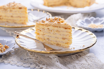 Napoleon cake - puff pastry cake layered with vanilla cream
