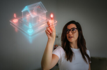 Woman activating smart home security system through virtual interface