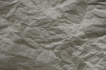 Brown crumpled recycled paper texture background. Kraft Paper
