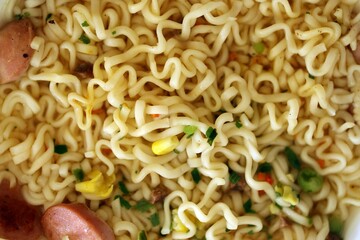 Noodles with spicy sauce and green onion chopped parts