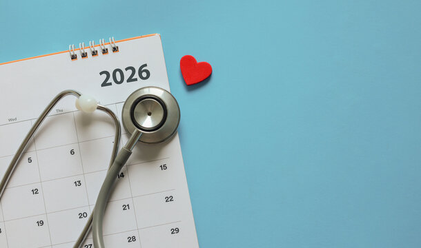  top view on red heart symbol and stethoscope on calendar  2026 with over blue background for design about ads or banner of doctor appointment and health checkup following personal lifestyle concept