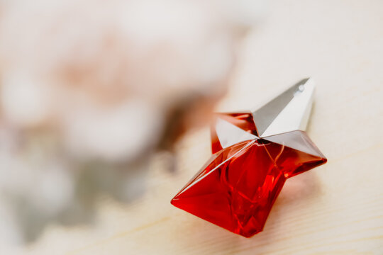 10.19.2025, Żory, Poland. Thierry Mugler perfume bottle displayed on neutral background, illustrating luxury fragrance branding and designer beauty product concept