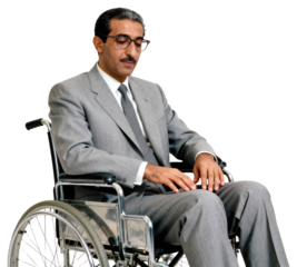 Somber Businessman in Wheelchair Looking Down in Thought
