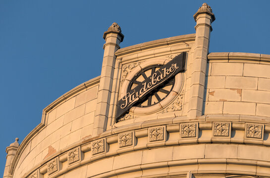 Famous Studebaker showroom building terra cotta facade detail at sunset on Bedford Avenue in Crown Heights, Brooklyn, New York City.