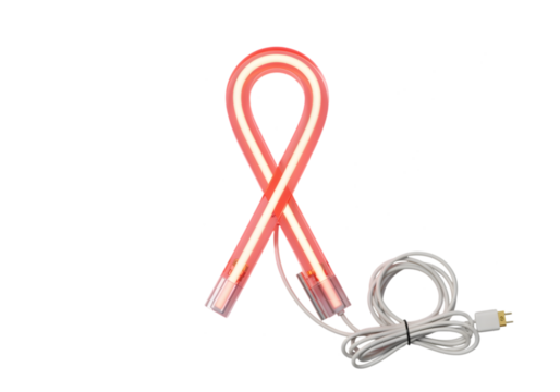 Illuminated pink ribbon shaped light fixture with white cord against a transparent background