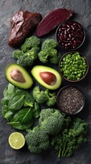 Overhead Still Life of Iron Rich Foods on Dark Background Featuring Liver Beets Beans and Green Vegetables for Healthy Diet and Nutrition