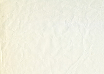 Vintage wrinkled paper texture. Old antique sheet paper texture. Aged white paper background.