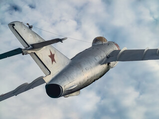 old Russian military fighter jet flies in the sky
