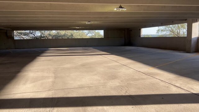 Empty parking garage with sunlight 
