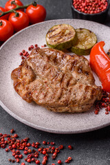 Grilled beef or pork steak, healthy restaurant food for lunch. Barbecue steak as a background
