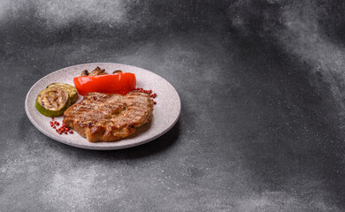 Grilled beef or pork steak, healthy restaurant food for lunch. Barbecue steak as a background