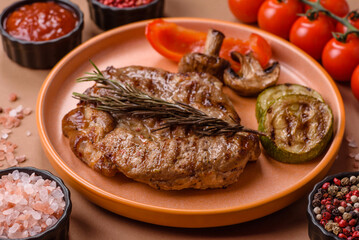 Grilled beef or pork steak, healthy restaurant food for lunch. Barbecue steak as a background