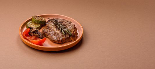 Grilled beef or pork steak, healthy restaurant food for lunch. Barbecue steak as a background