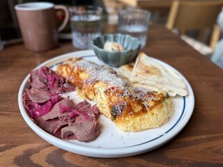 Gourmet Breakfast Plate with Omelette and Roast Beef