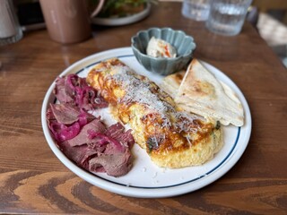 Gourmet Breakfast Plate with Omelette and Roast Beef