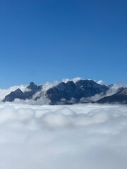Mountain above clouds