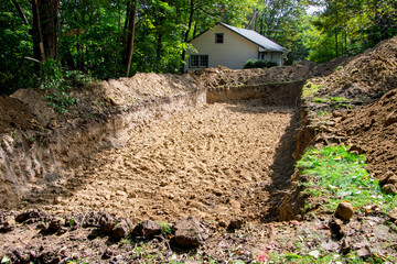 Completed excavaction of drain field for a home septic system
 system before fill material and piping are added.
