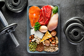 Sources of protein. High protein food for bodybuilders as fish, beef, chicken breast, dairy, eggs, buckwheat, nuts, bean, pumpkin seed, sunflower seed.