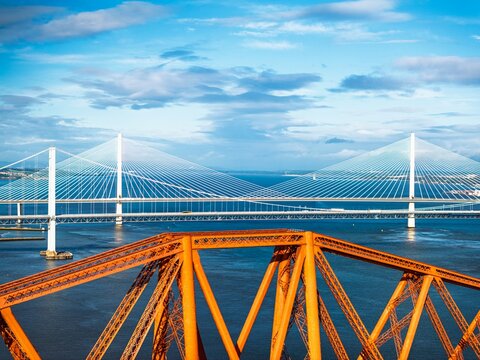 Forth Bridge from a drone, Queensferry Crossing, Forth Estuary, Scotland