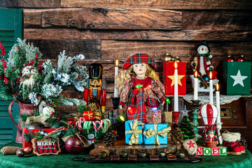 maximalist Christmas with pretty girl doll draped in colorful lights surrounded by presents and decorations