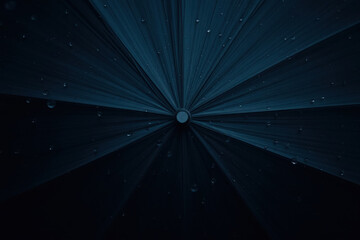 Close-up of rain from an umbrella. Hazy, vibrant, lively – a captivating moment.