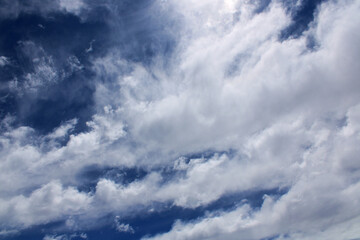 Near the clouds, beautiful blue sky with white clouds