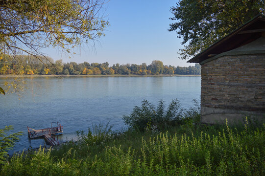 This photo beautifully captures the calm, natural charm of Zeleni otok in Baranja, with mighty Danube river, lush vegetation, and the serene riverside atmosphere typical of the area