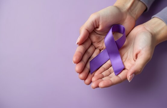 Hands hold purple ribbon symbolizing awareness and support for leprosy and other diseases. This visual conveys empathy and global health solidarity, highlighting prevention and care efforts worldwide.