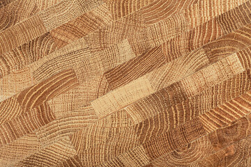 Natural wood texture - oak wooden board as background. Durable end grain hard wood cutting board.