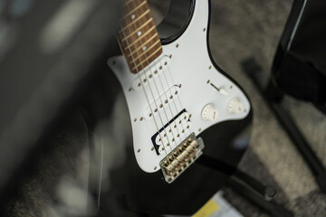 Electric guitar body and strings closeup