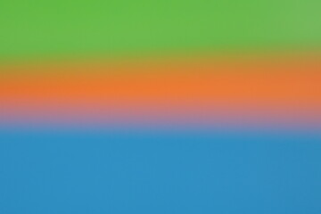 Obraz premium Una toma de cerca de un fondo abstracto de varios colores con un degradado ligero desenfocado