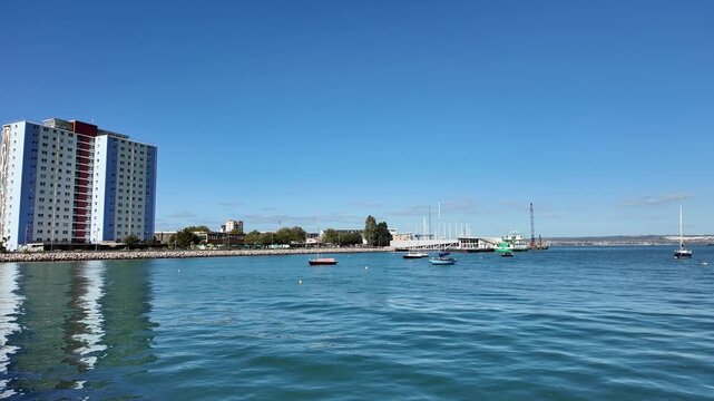 Portsmouth Harbour viewed from the Gosport side looking towards the Portsmouth waterfront and port.
