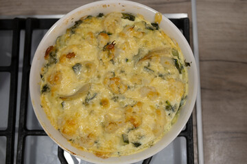 Noodle Casserole with Cheese, Sauce, and Spinach