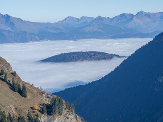 Sea of Clouds over Alpine Valley in the French Alps at Sunrise
