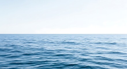 Obraz premium Calm Blue Ocean Under Clear Sky.