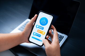 Artificial intelligence concept of intelligent assistant in daily life, young man using smartphone...