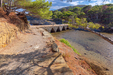 Stone bridge by the coast in Cadaques Spain