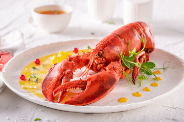 Elegant steamed lobster as a mediterranean traditional dinner.