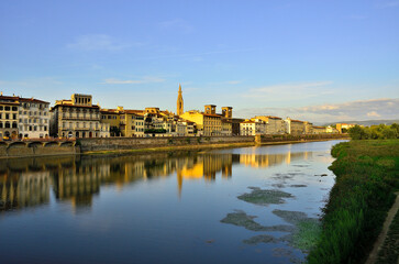 A view of Florence by the Arno River from the Ponte alle Grazie, facing West.
