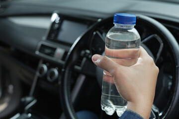 The water bottle in the car