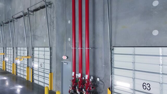 fire sprinklers water supply pipe system on wall inside warehouse in 4k