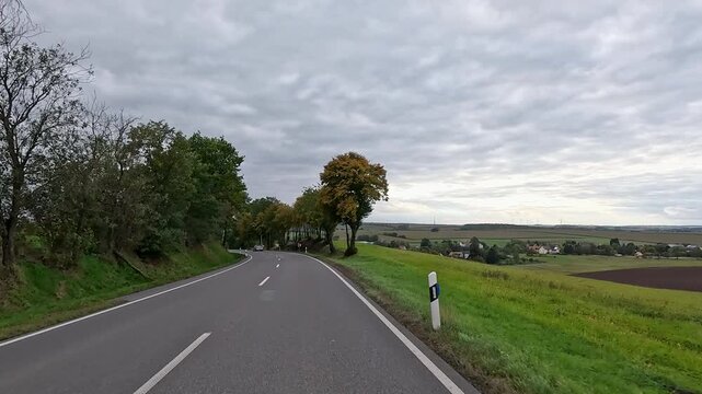 Dresden Germany niederschona village rural POV. Driving point of view. Industrial center of East Germany, now unified German, European Union (EU) and NATO. Total destruction in WW II and now rebuilt.