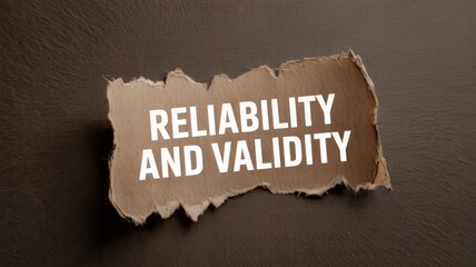 Reliability and validity concept on torn paper against a dark background for quality assurance and trustworthy data