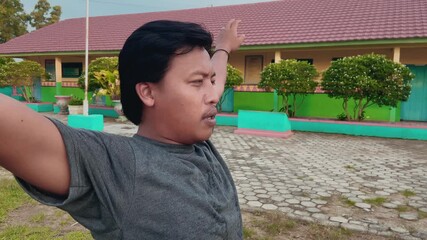 Man stretching arms before exercise outdoors