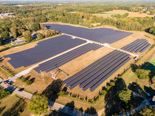 Sunny Daytime Aerial Drone Images of a Solar Farm in Zebulon, North Carolina: Technology, Environment, Sustainable Energy