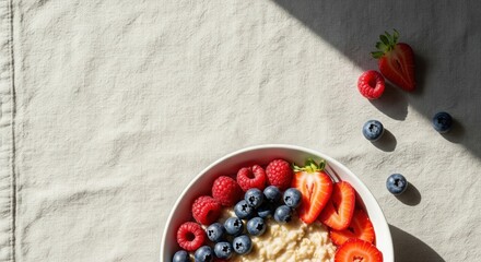Top-Down Bright Flatlay of Oatmeal Bowl with Berries